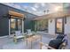 The outdoor patio is furnished with comfortable seating and natural light at 4809 N 30Th Pl, Phoenix, AZ 85016