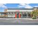 Inviting restaurant with modern design, outdoor seating, and prominent signage under a partly cloudy blue sky at 4809 N 30Th Pl, Phoenix, AZ 85016