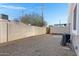 The private backyard has gravel and a tan block wall at 5236 N 16Th Ln, Phoenix, AZ 85015