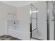 Bathroom showcasing a large jacuzzi tub and stand up shower with glass doors at 5236 N 16Th Ln, Phoenix, AZ 85015