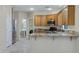 Open kitchen with granite countertops, stainless steel appliances and center island with breakfast bar at 5236 N 16Th Ln, Phoenix, AZ 85015