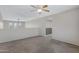 Loft area with a ceiling fan, carpeted floor and neutral paint at 5236 N 16Th Ln, Phoenix, AZ 85015