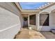 Inviting front entrance with decorative wreath, plants and stone walkway at 5258 E Elena Ave, Mesa, AZ 85206