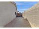 Side yard access to the backyard with block fence for privacy at 5258 E Elena Ave, Mesa, AZ 85206
