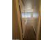 Hallway view featuring neutral carpet and paint leading to a bedroom at the end of the hall at 5639 N 46Th Ave, Glendale, AZ 85301