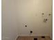 Laundry hookup in the laundry room area featuring white walls and tiled floors at 5639 N 46Th Ave, Glendale, AZ 85301