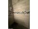 Tile shower stall featuring a showerhead, upgraded fixtures, and pebble floor at 5639 N 46Th Ave, Glendale, AZ 85301