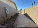 Side yard showing a concrete pathway along the side of the house at 5639 N 46Th Ave, Glendale, AZ 85301
