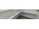 Storage closet featuring carpeted floor and white wood racking at 5832 E Covey Ln, Phoenix, AZ 85054