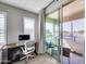 Office area with an adjacent private balcony featuring comfortable seating and scenic views at 734 E Doral Ave # 202, Gilbert, AZ 85297