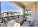 Charming balcony space with an open view, a potted plant and outdoor seating area at 734 E Doral Ave # 202, Gilbert, AZ 85297