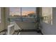 Scenic balcony featuring outdoor seating and a plant, offering an open view of the community at 734 E Doral Ave # 202, Gilbert, AZ 85297