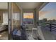 Cozy balcony with chairs offering a scenic neighborhood view at 734 E Doral Ave # 202, Gilbert, AZ 85297