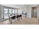 Dining area with natural light, wood floors, and stylish decor at 734 E Doral Ave # 202, Gilbert, AZ 85297