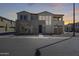 Modern two-story home featuring a balcony and neutral stucco exterior at 734 E Doral Ave # 202, Gilbert, AZ 85297