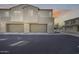 Modern townhomes with two-car garages and neutral stucco exteriors at 734 E Doral Ave # 202, Gilbert, AZ 85297