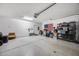 Spacious garage with epoxy floors, ample storage racks and accessories at 734 E Doral Ave # 202, Gilbert, AZ 85297