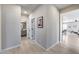 Inviting hallway leading to open-concept living spaces with natural light and modern finishes at 734 E Doral Ave # 202, Gilbert, AZ 85297