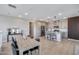 Well-lit space featuring an open floor plan connecting the dining and kitchen areas at 734 E Doral Ave # 202, Gilbert, AZ 85297