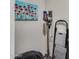 This utility storage area has a vacuum, wall art, and step ladder at 734 E Doral Ave # 202, Gilbert, AZ 85297