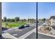 Neighborhood street view showcasing well-maintained roads and community amenities at 734 E Doral Ave # 202, Gilbert, AZ 85297