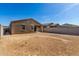 Expansive backyard, ideal for outdoor activities, with a covered patio at 7456 N 126Th Ln, Glendale, AZ 85307