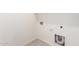 Laundry room with tile floors at 7456 N 126Th Ln, Glendale, AZ 85307