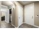 Hallway leads to the bathroom and laundry area, offering convenience and functionality at 7601 E Indian Bend Rd # 2056, Scottsdale, AZ 85250