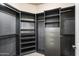 Organized walk-in closet with custom shelving and drawers providing ample storage space at 7601 E Indian Bend Rd # 2056, Scottsdale, AZ 85250