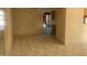 Open living area featuring tile flooring and a smooth transition to the kitchen and other spaces at 8640 S 16Th Pl, Phoenix, AZ 85042