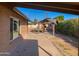 Spacious backyard patio with a covered seating area and outdoor fireplace at 8640 S 16Th Pl, Phoenix, AZ 85042