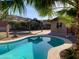 View of the sparkling backyard pool and shaded gazebo area creating an outdoor oasis at 8640 S 16Th Pl, Phoenix, AZ 85042