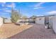 Spacious backyard with desert landscaping featuring a cactus, pool/spa, and patio cover at 8760 W Meadow Dr, Peoria, AZ 85382