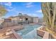 Backyard pool with patio and desert landscaping at 8760 W Meadow Dr, Peoria, AZ 85382