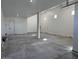 Spacious two car garage with modern doors and ample room for parking and storage at 10039 W Verde Ln, Avondale, AZ 85392