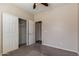 Bedroom featuring carpet flooring and closet with sliding doors at 10287 S 175Th Ave, Goodyear, AZ 85338