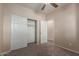 Bedroom with closet and ensuite door, perfect for privacy and convenience at 10287 S 175Th Ave, Goodyear, AZ 85338