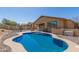 Private pool with patio seating provides a relaxing space in this home's backyard at 10287 S 175Th Ave, Goodyear, AZ 85338