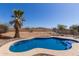 Backyard pool showcasing desert landscaping with a mountain view perfect for relaxation and enjoying the outdoor scenery at 10287 S 175Th Ave, Goodyear, AZ 85338