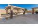 Outdoor covered patio with furniture on a concrete deck, ideal for enjoying the backyard at 11872 W Sherman St, Avondale, AZ 85323