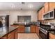 Kitchen featuring granite countertops, stainless steel appliances, and ample natural light at 11872 W Sherman St, Avondale, AZ 85323