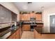 Well-appointed kitchen features granite countertops, stainless steel appliances, and a pantry at 11872 W Sherman St, Avondale, AZ 85323