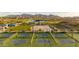 Community park featuring pickleball courts, a basketball court, and a small lake at 12552 W Trumbull Rd, Avondale, AZ 85323