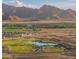 Community park offers a lake, a playground, sports fields, and green lawns with mountain views at 12552 W Trumbull Rd, Avondale, AZ 85323