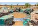 A unique gathering space surrounded by turquoise rocks, creating a serene and visually appealing area for community members at 12552 W Trumbull Rd, Avondale, AZ 85323