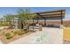 Inviting picnic shelter with hopscotch game offers shaded seating and activities, perfect for Gathering outings and community events at 12552 W Trumbull Rd, Avondale, AZ 85323