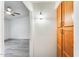 Hallway featuring light wood colored cabinetry and entrance into the living room at 15412 N 160Th Ln, Surprise, AZ 85374