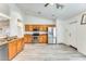 Kitchen with oak cabinets, stainless steel appliances and wood-look flooring at 15412 N 160Th Ln, Surprise, AZ 85374
