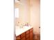 Simple bathroom with a vanity, mirror, and standard toilet at 16120 W Kendall St, Goodyear, AZ 85338