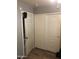 Basic closet with sliding doors and a secondary door leading to bathroom at 16120 W Kendall St, Goodyear, AZ 85338